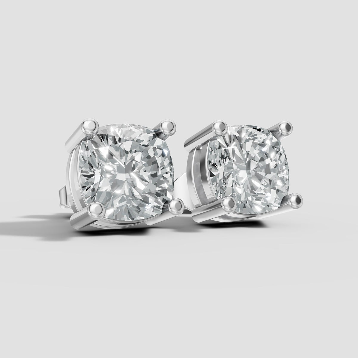 Cushion Four Prong Studs in White Gold