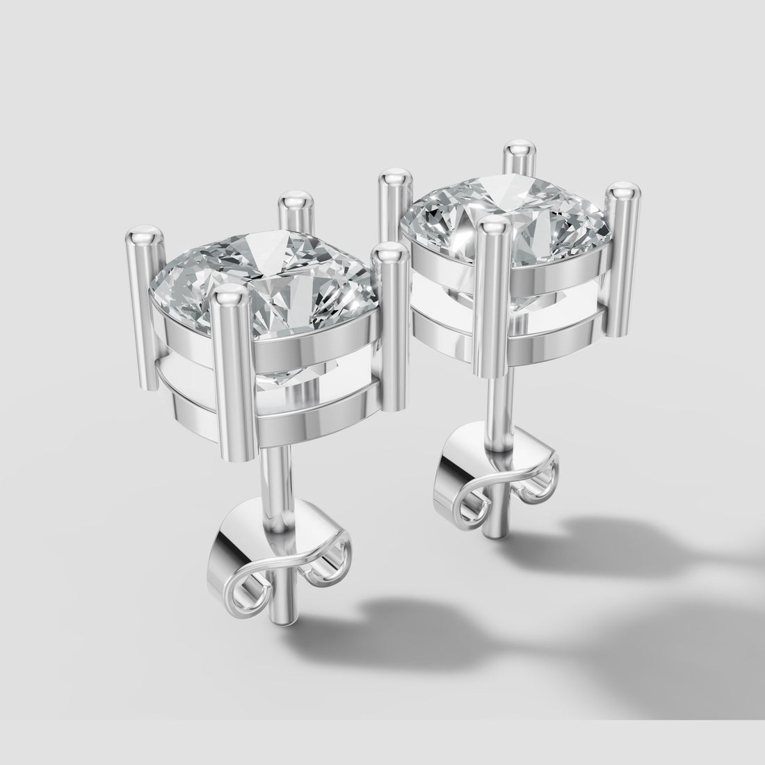 Cushion Four Prong Studs in White Gold