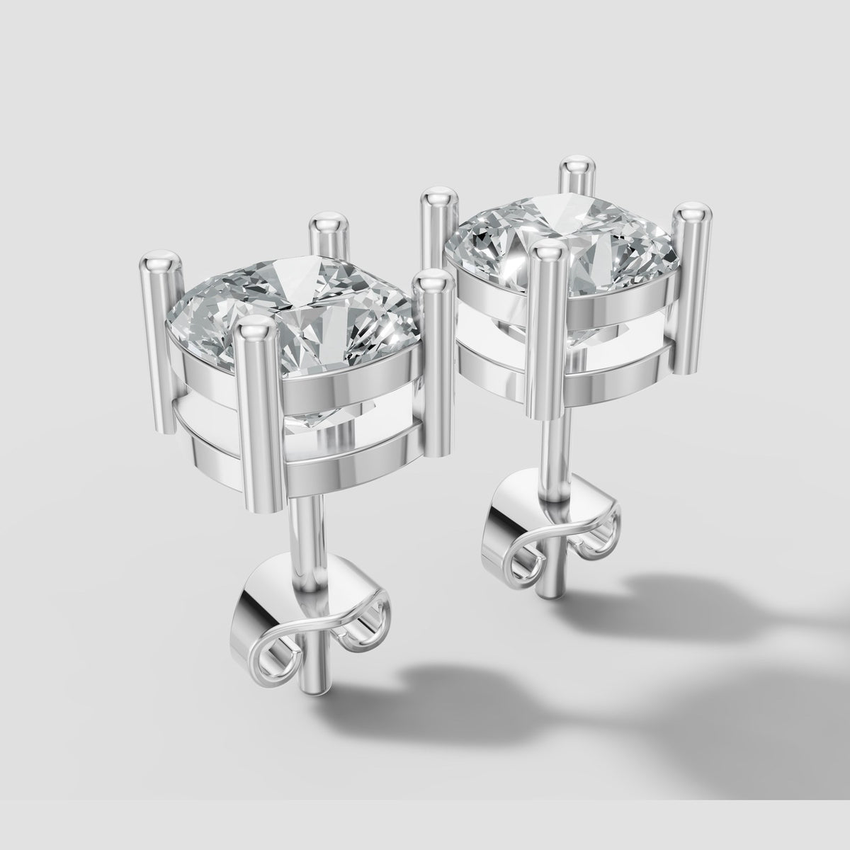 Cushion Four Prong Studs in White Gold