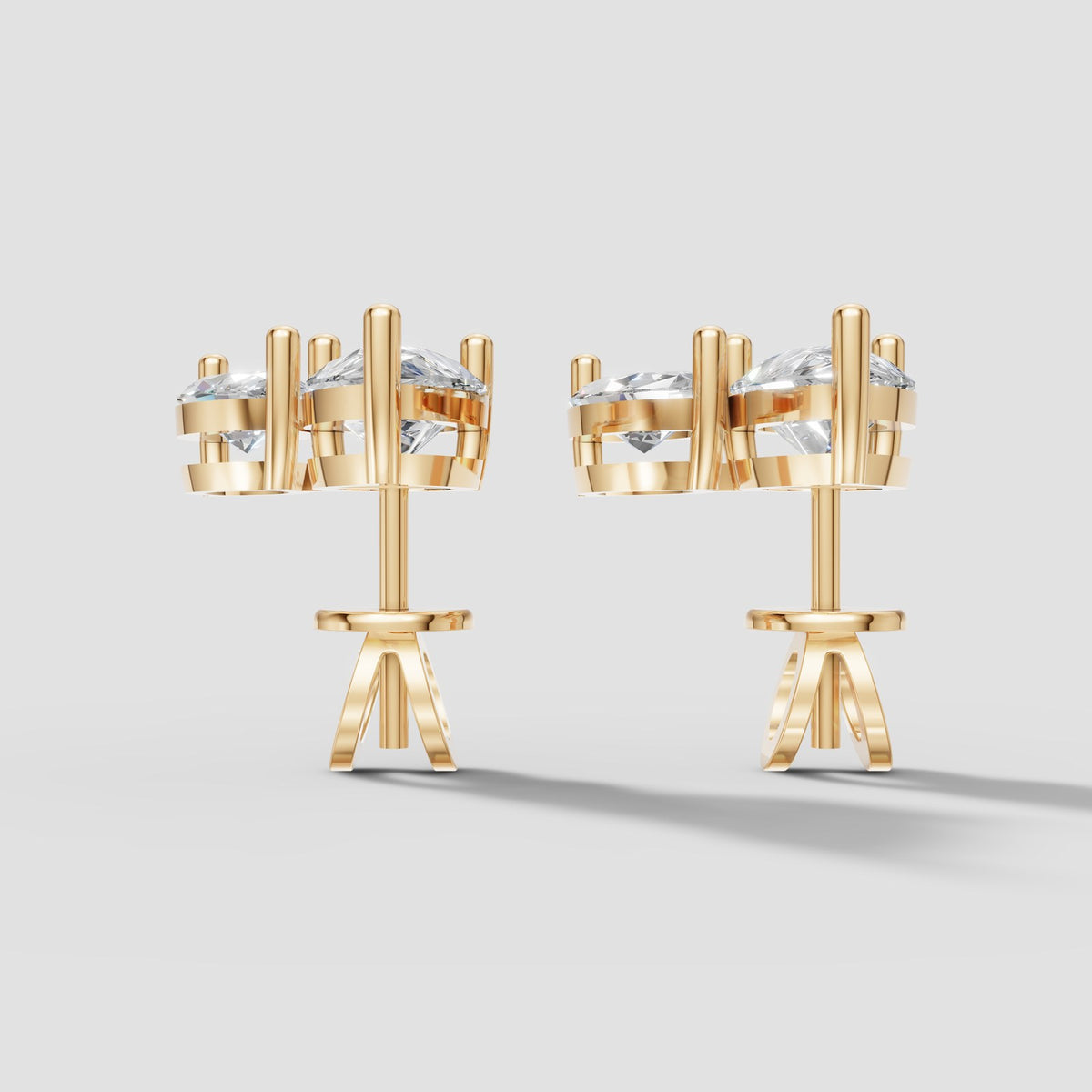 Duo Marquise and Pear Studs in Yellow Gold