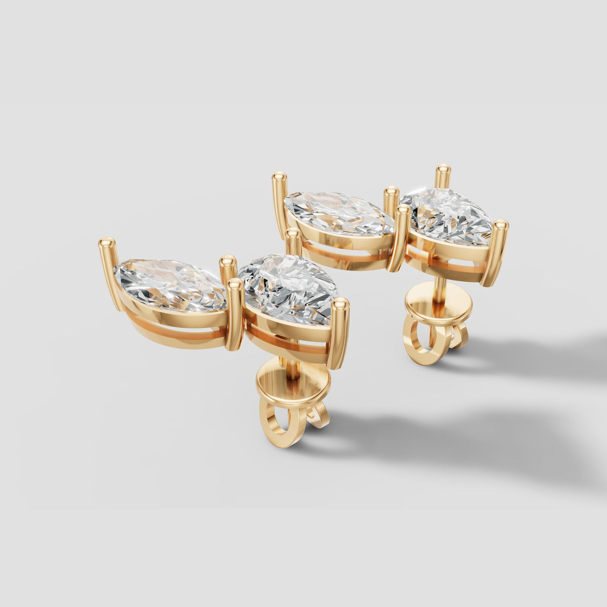 Duo Marquise and Pear Studs in Yellow Gold
