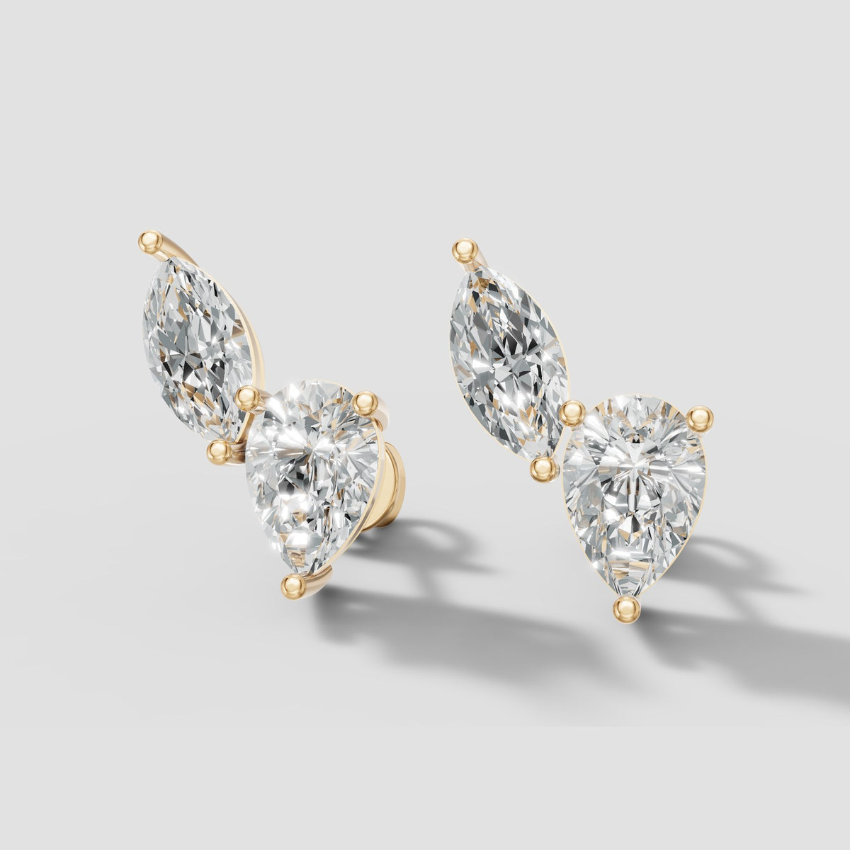 Duo Marquise and Pear Studs in Yellow Gold