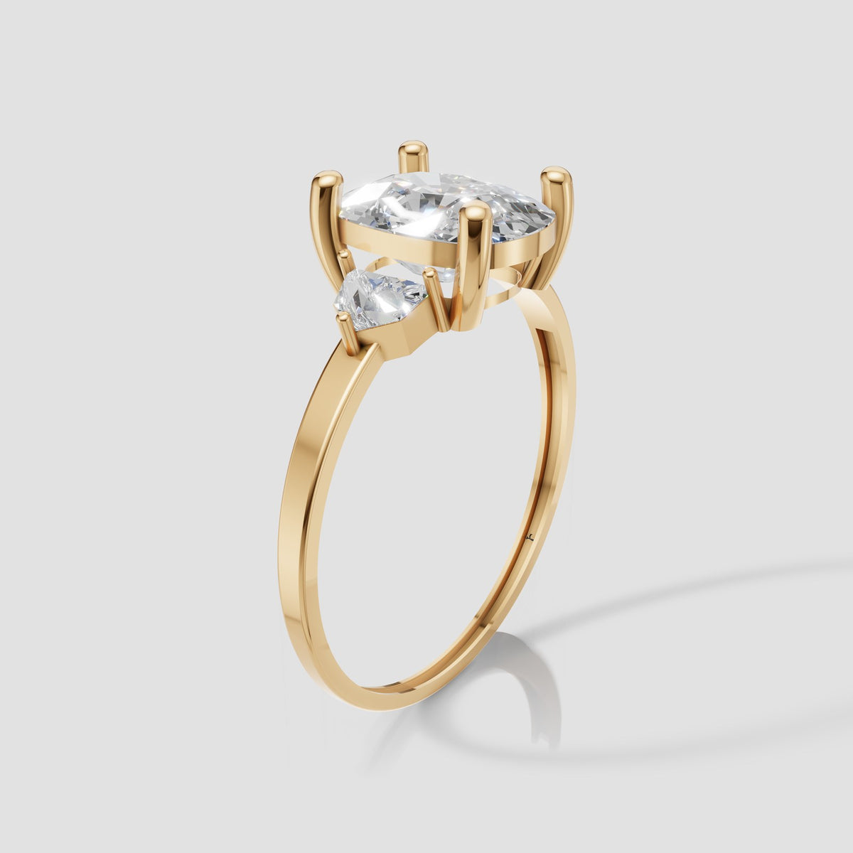 Hazel Cushion Three Stone in Yellow Gold