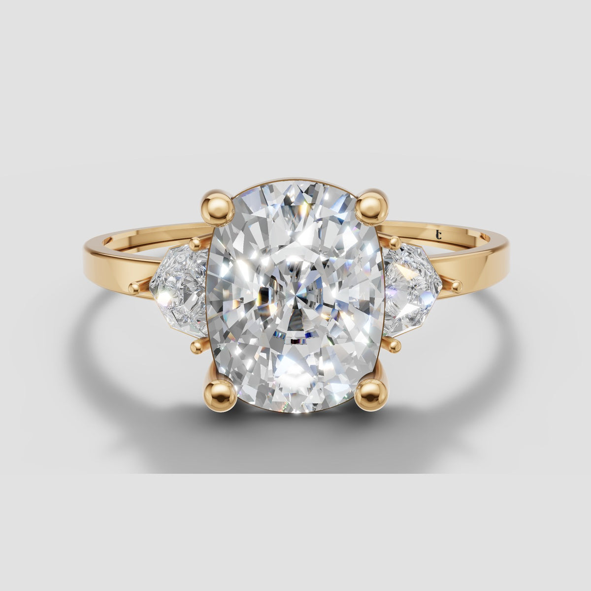 Hazel Cushion Three Stone in Yellow Gold