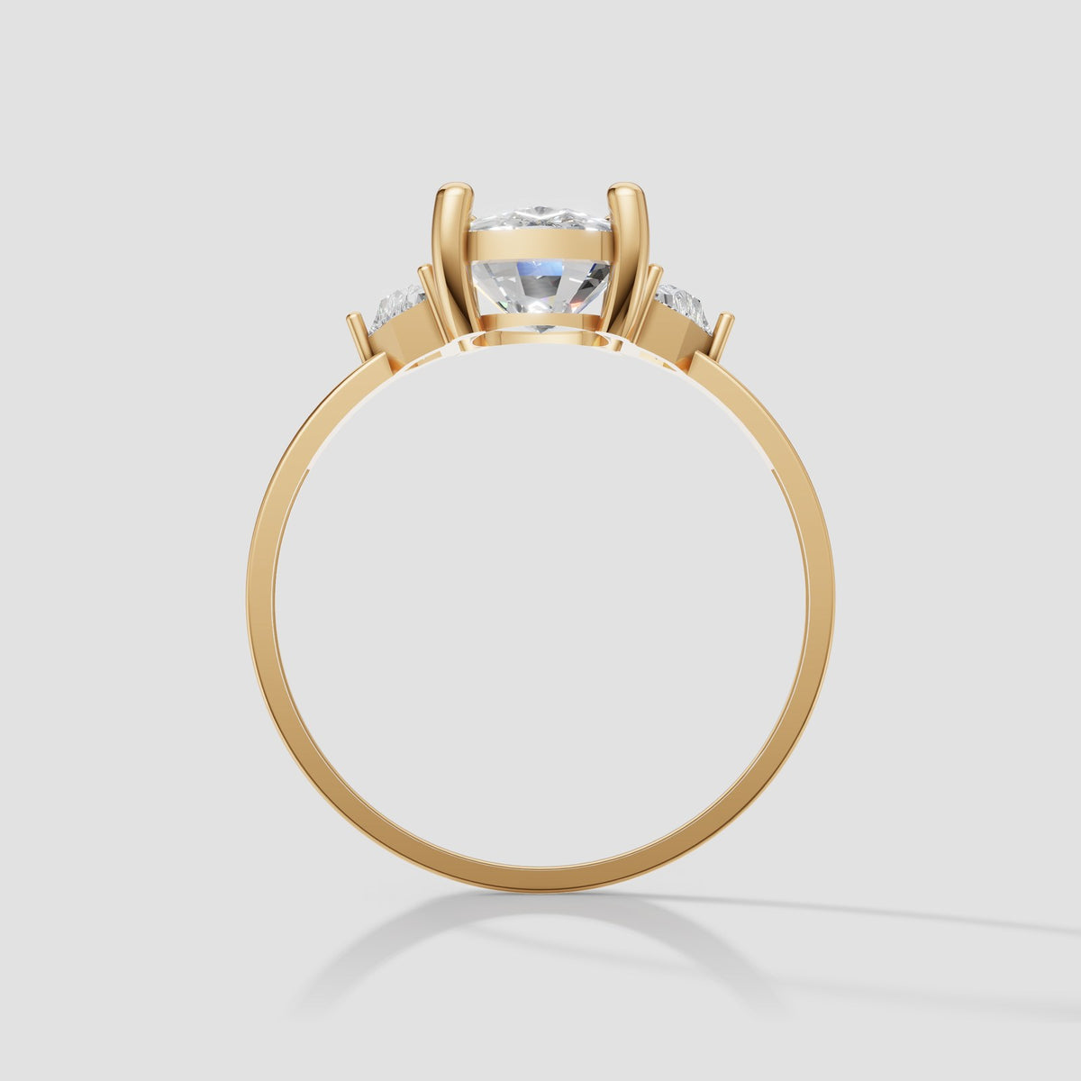 Hazel Cushion Three Stone in Yellow Gold