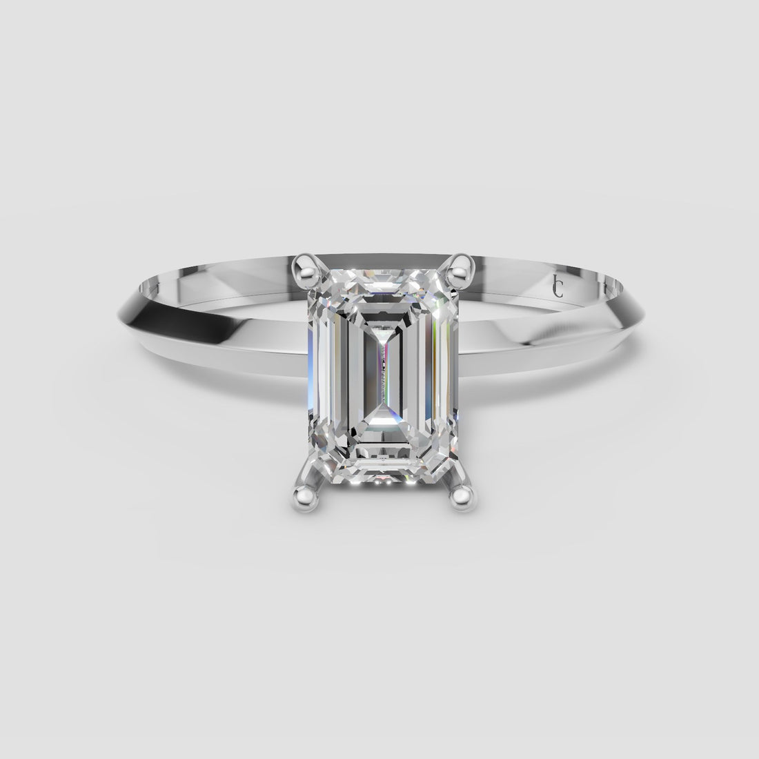 Iris Emerald Solitaire in White Gold