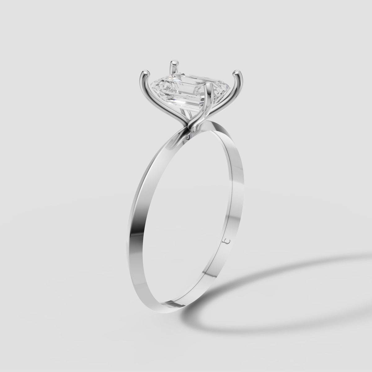Iris Emerald Solitaire in White Gold