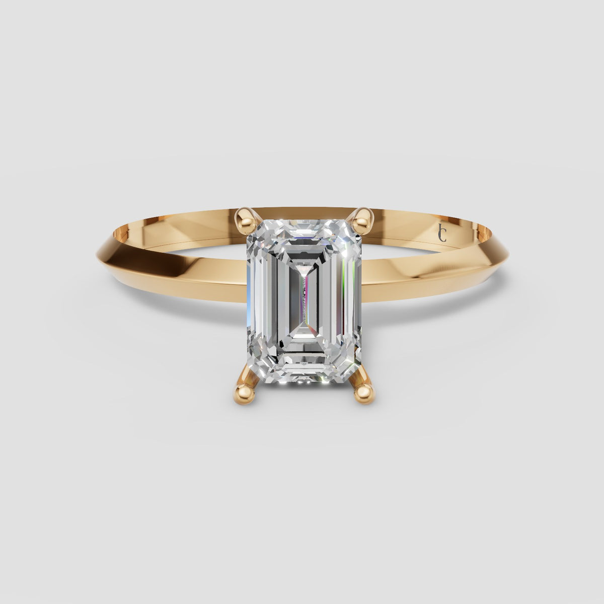 Iris Emerald Solitaire in Yellow Gold