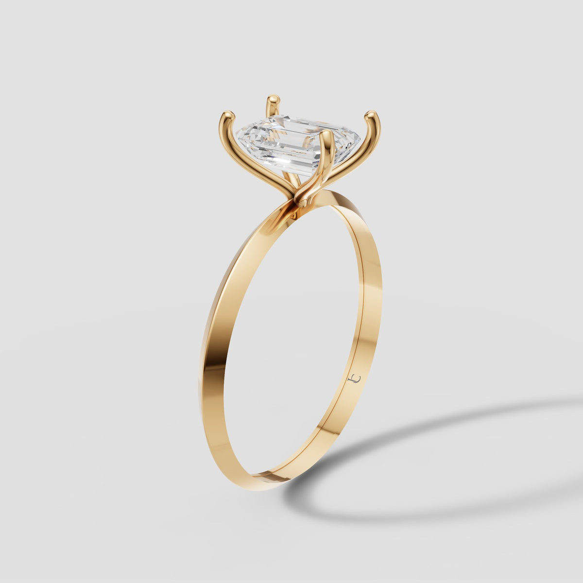 Iris Emerald Solitaire in Yellow Gold