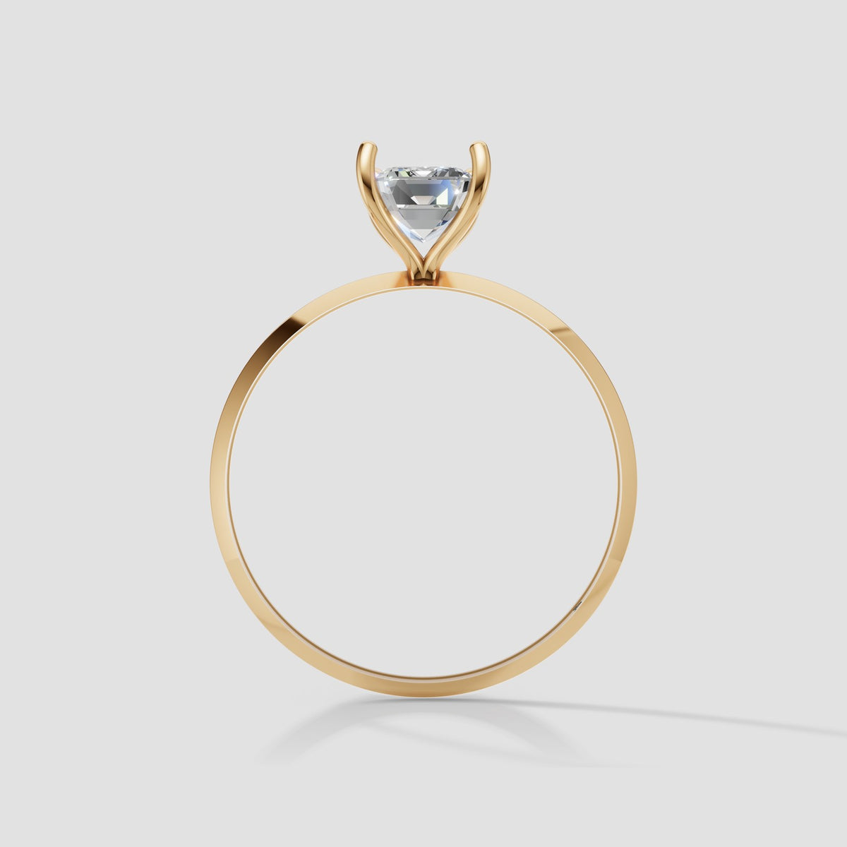 Iris Emerald Solitaire in Yellow Gold