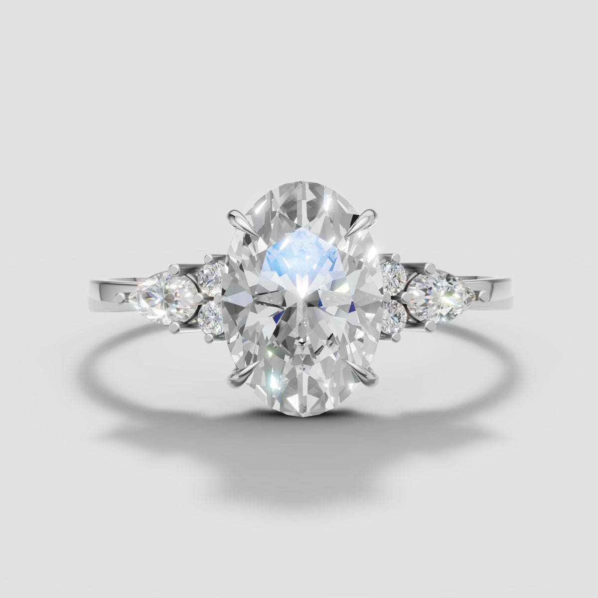 Lyra Oval Cluster Ring in White Gold