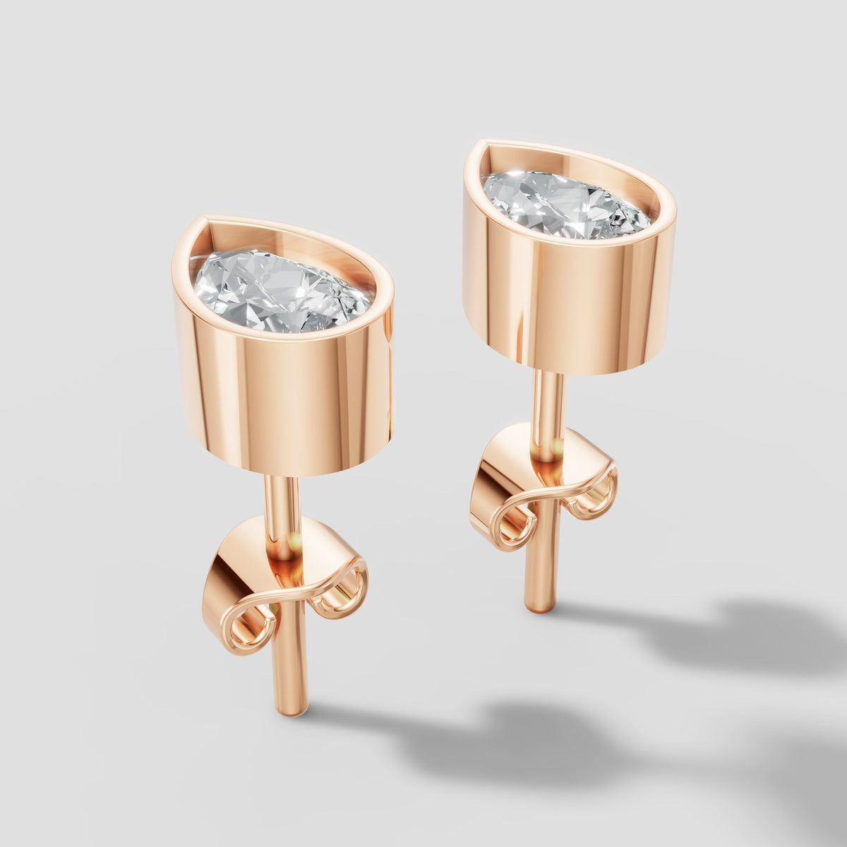 Pear Bezel Studs in Rose Gold