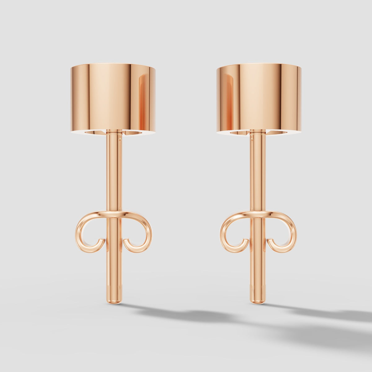 Pear Bezel Studs in Rose Gold