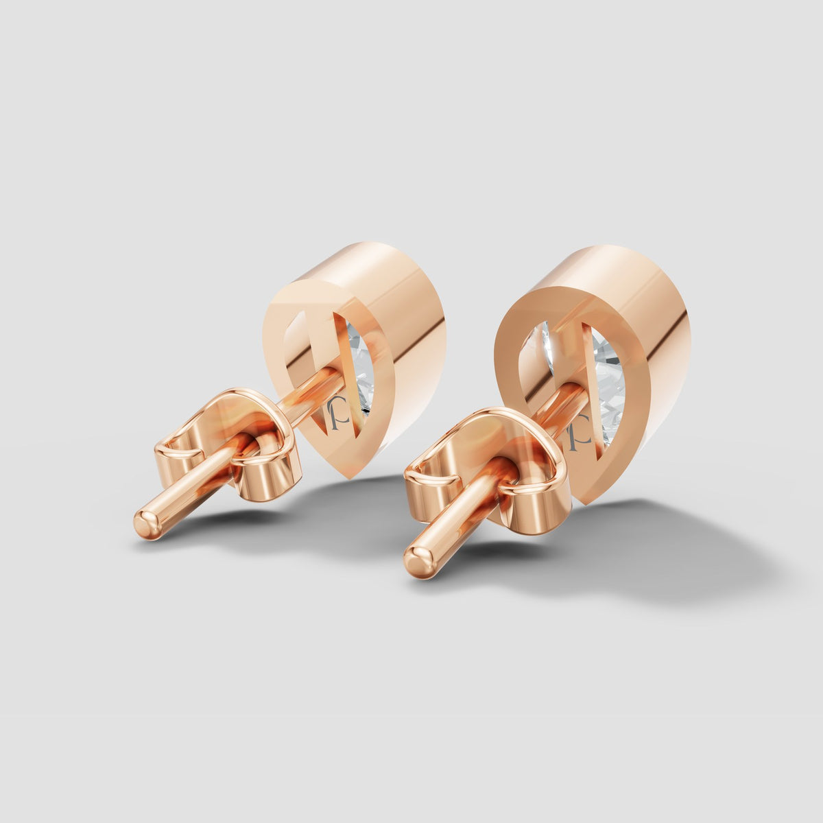 Pear Bezel Studs in Rose Gold
