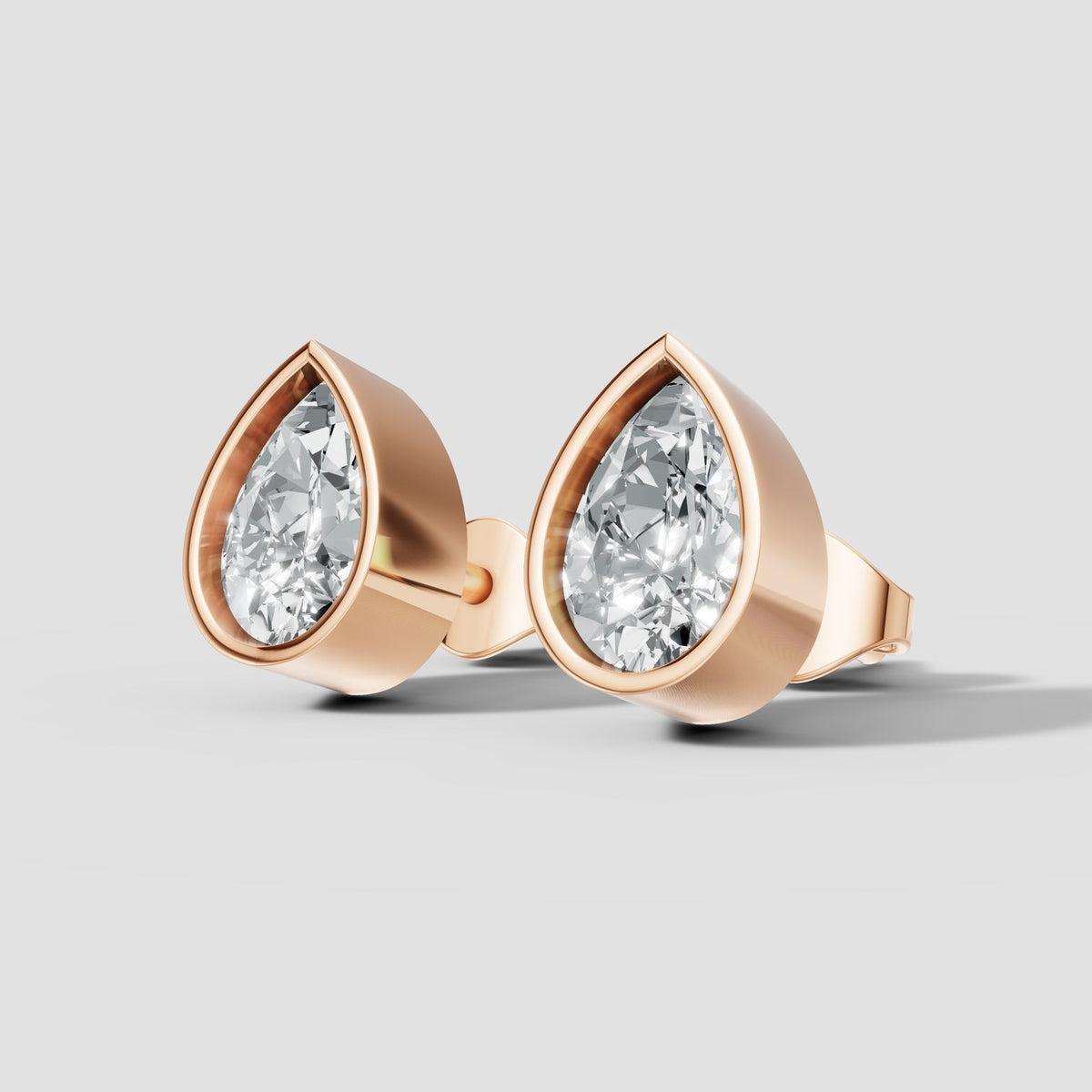 Pear Bezel Studs in Rose Gold