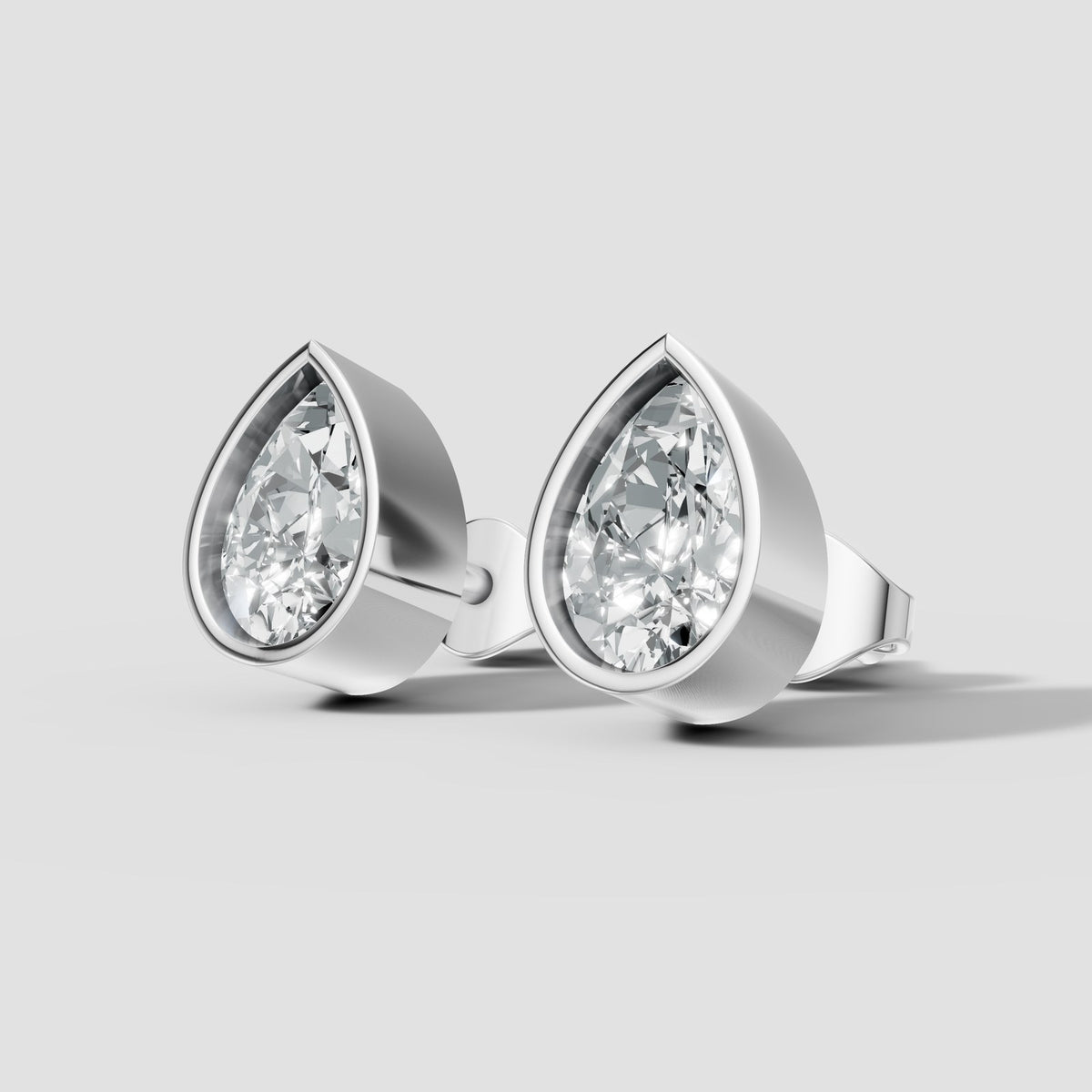 Pear Bezel Studs in White Gold