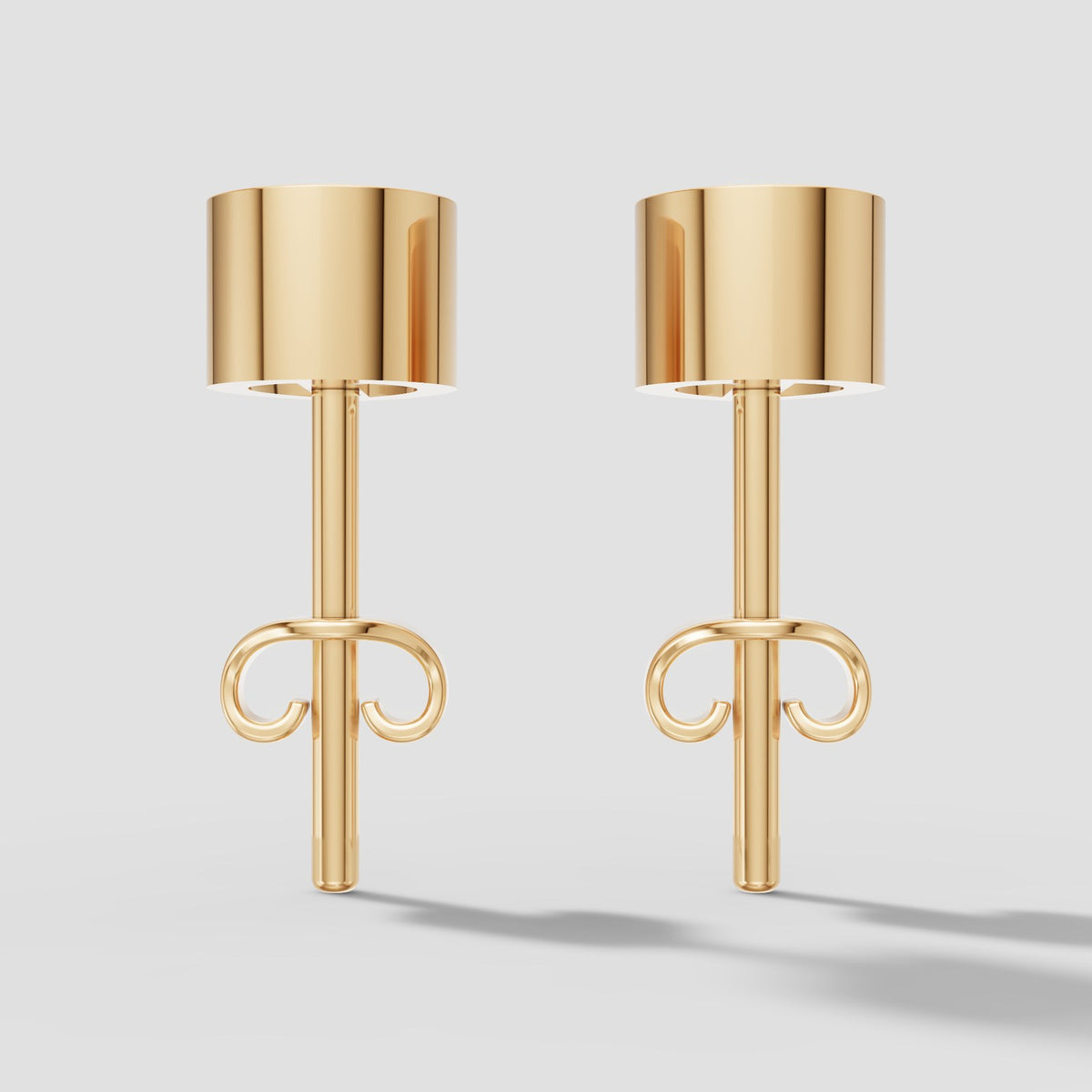 Pear Bezel Studs in Yellow Gold