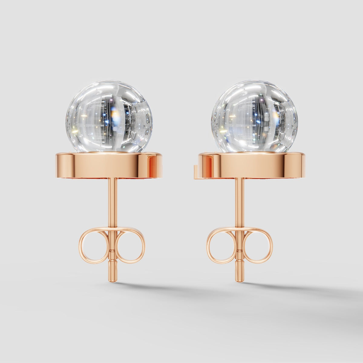 Perla Crossover Pearl Earrings in Rose Gold