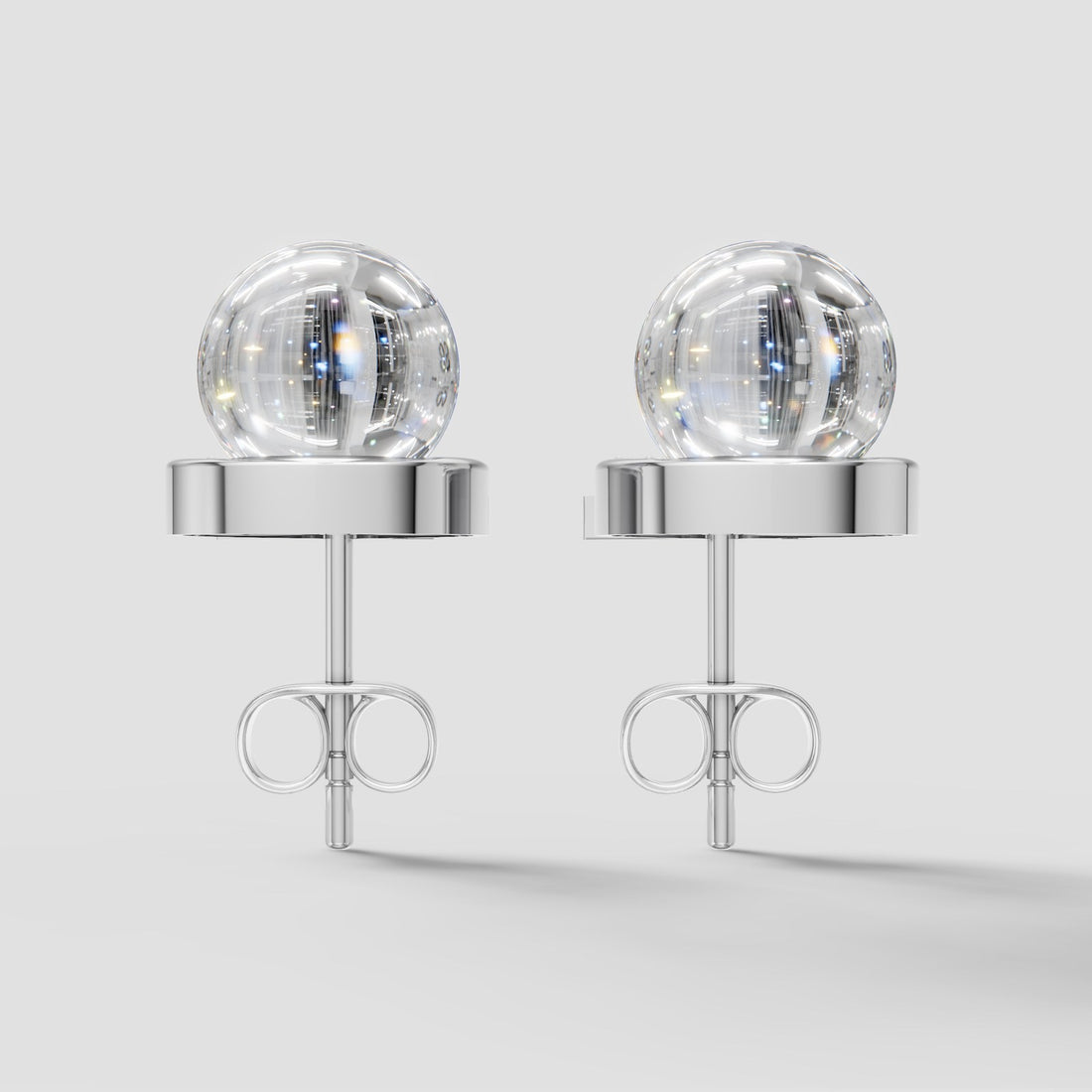 Perla Crossover Pearl Earrings in White Gold