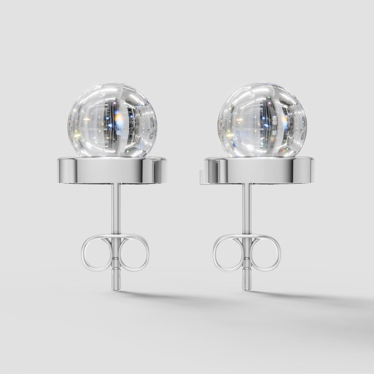 Perla Crossover Pearl Earrings in White Gold