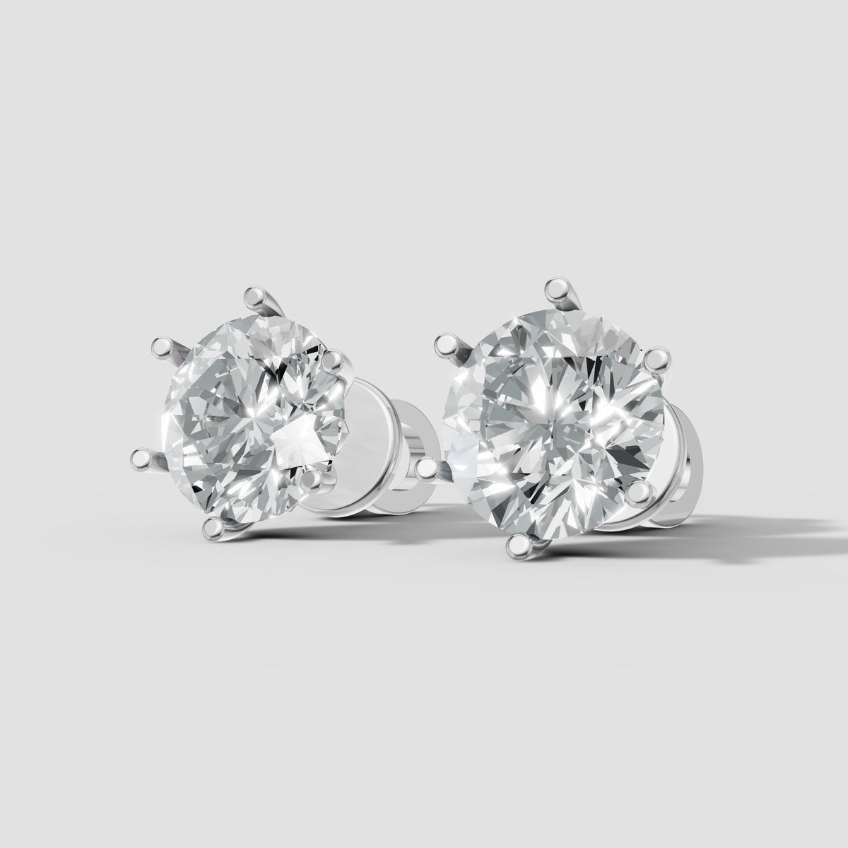 Round Six Prong Studs in White Gold