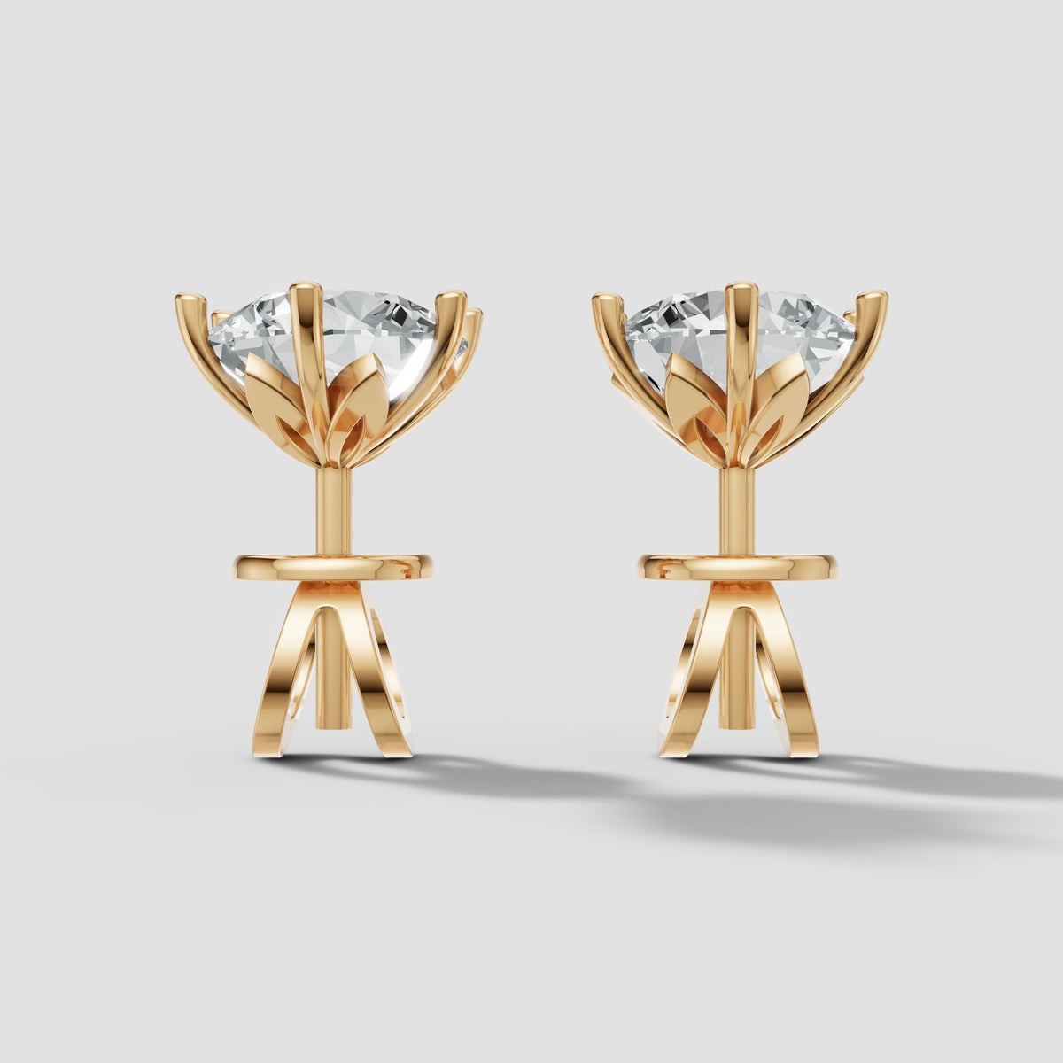 Round Six Prong Studs in Yellow Gold