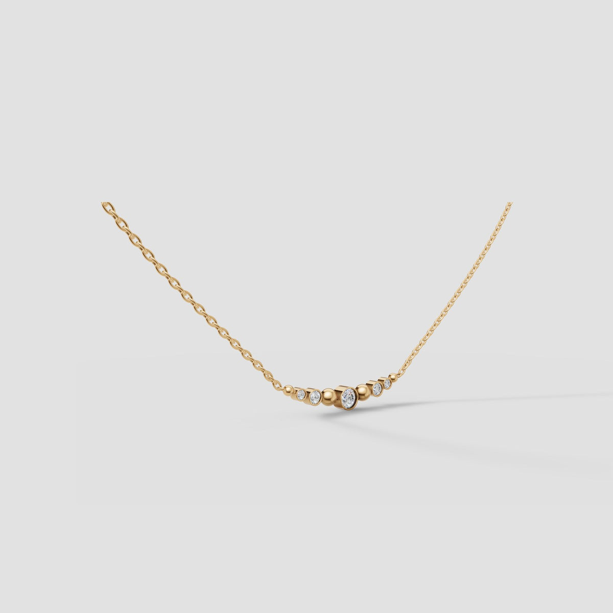 Solene Graduated Bezel Necklace in Yellow Gold