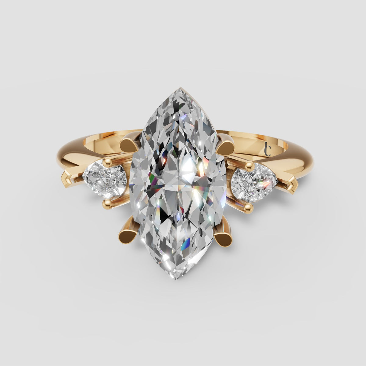 Zara Marquise Three Stone in Yellow Gold