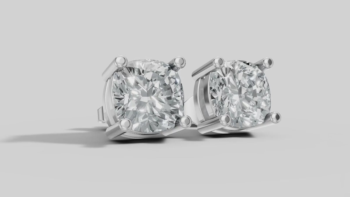 Cushion Four Prong Studs in White Gold video