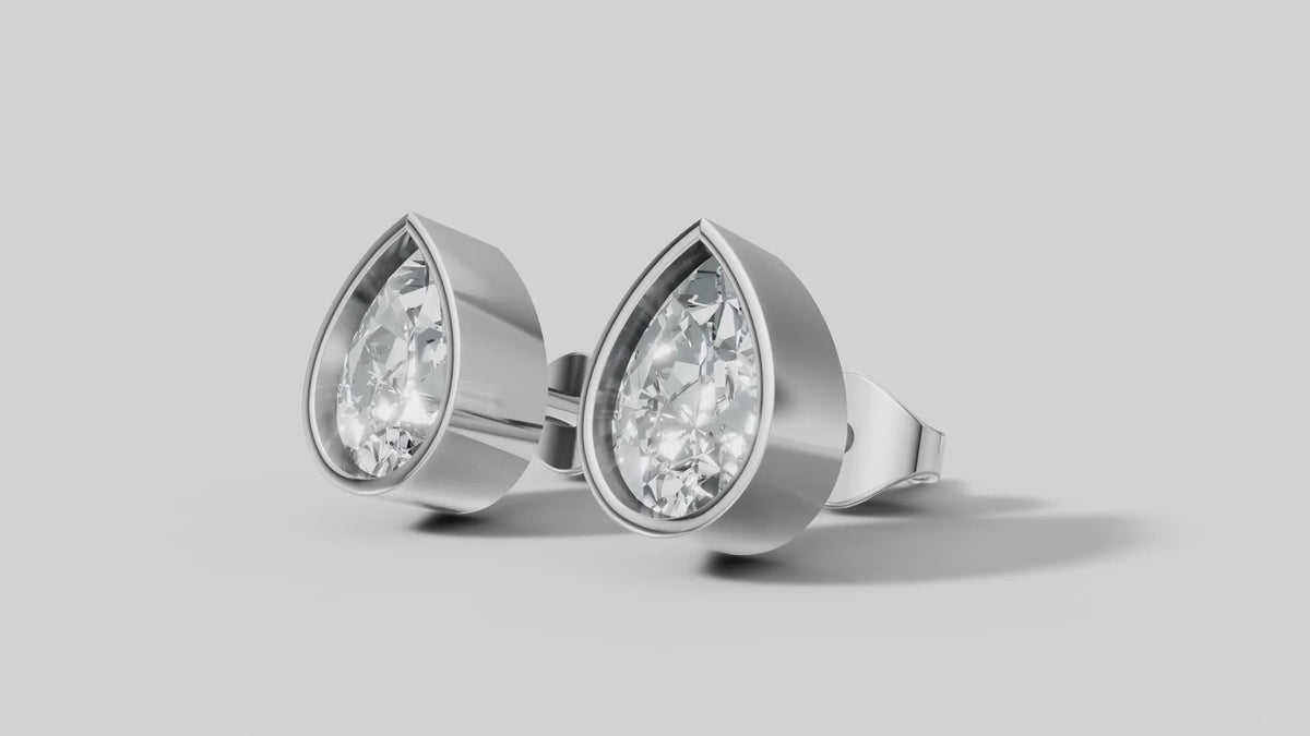 Pear Bezel Studs in White Gold video